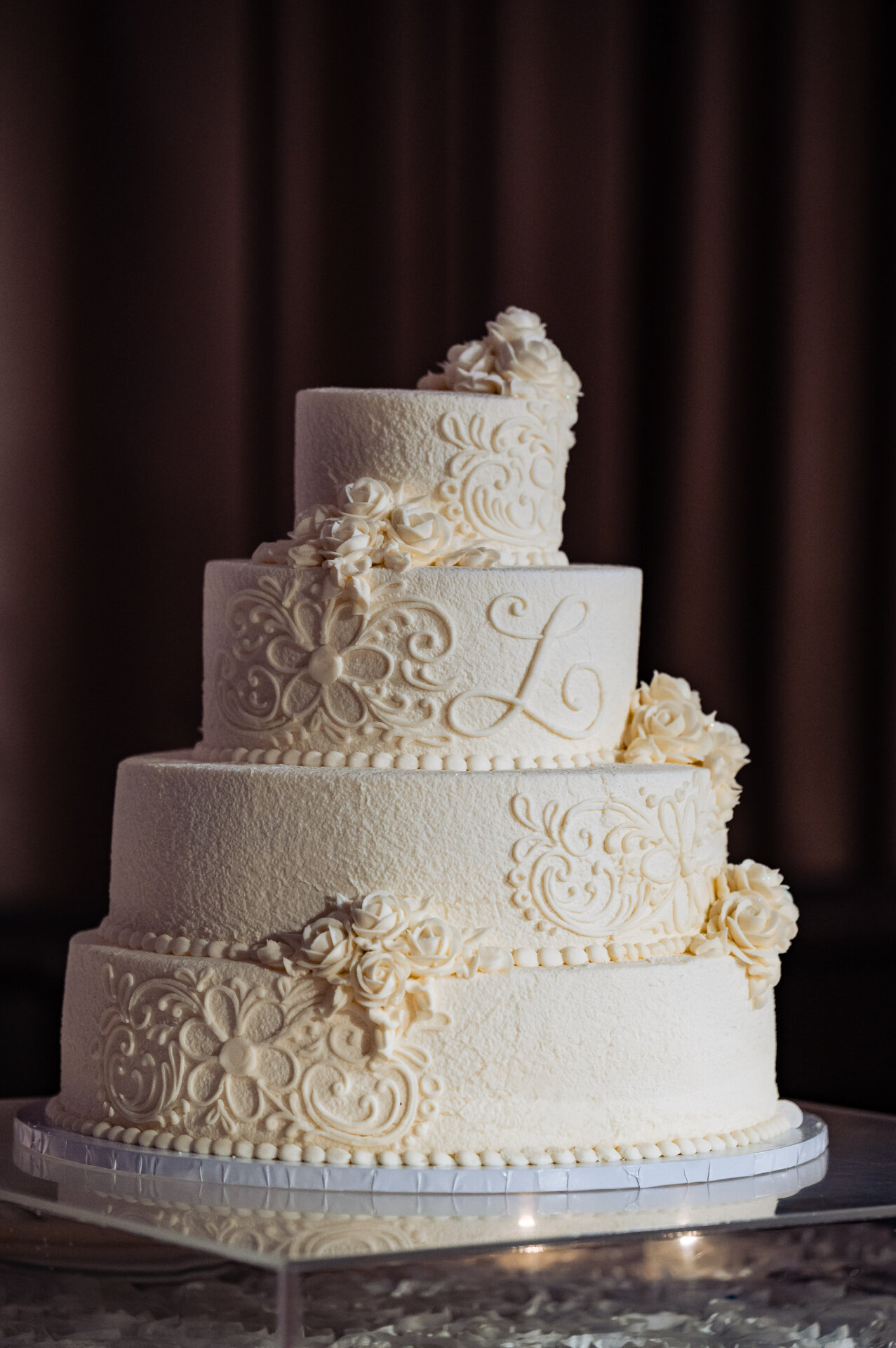 white wedding cake with white accents