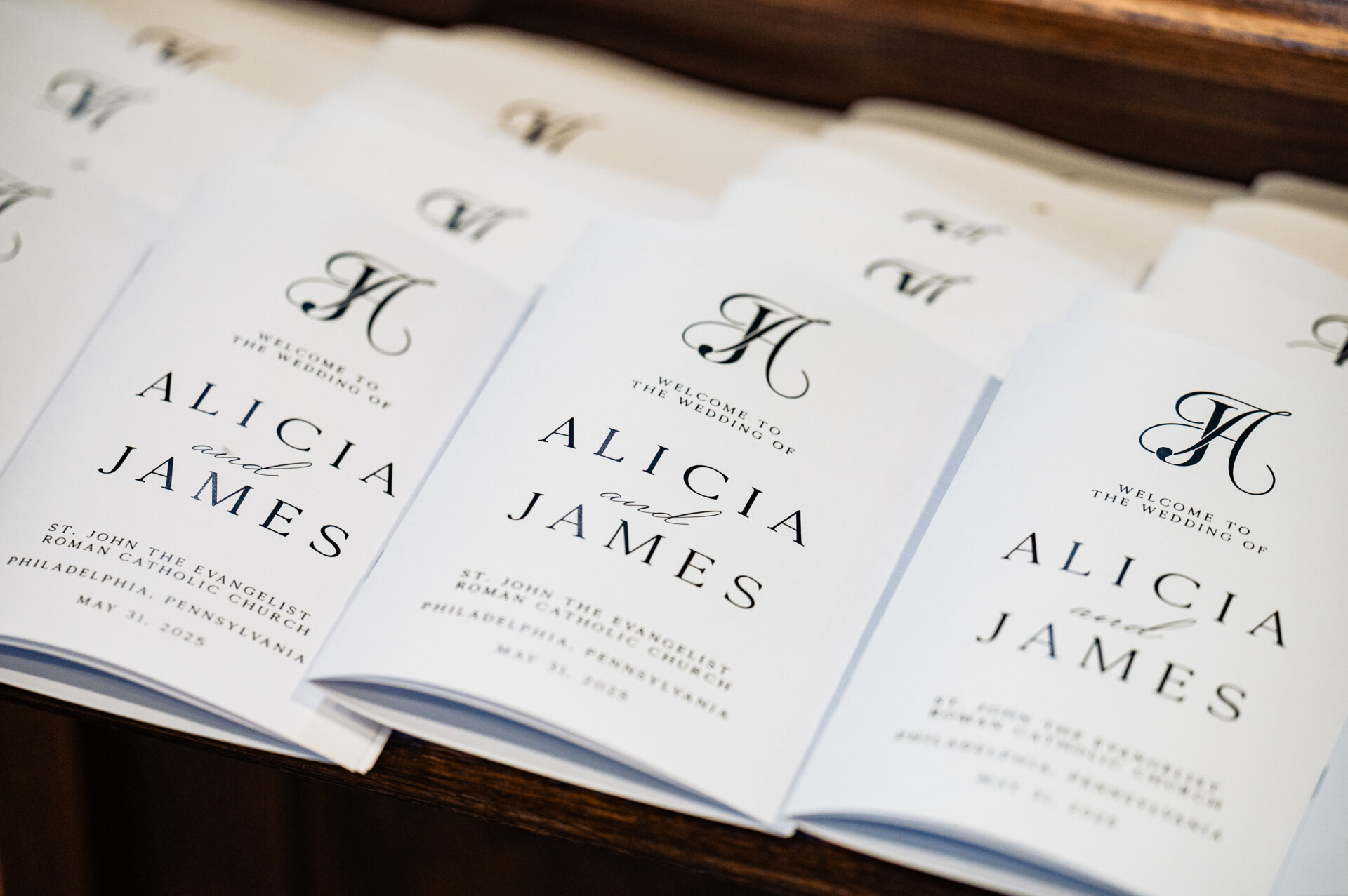 Wedding invitation cards lined up for a detail photo