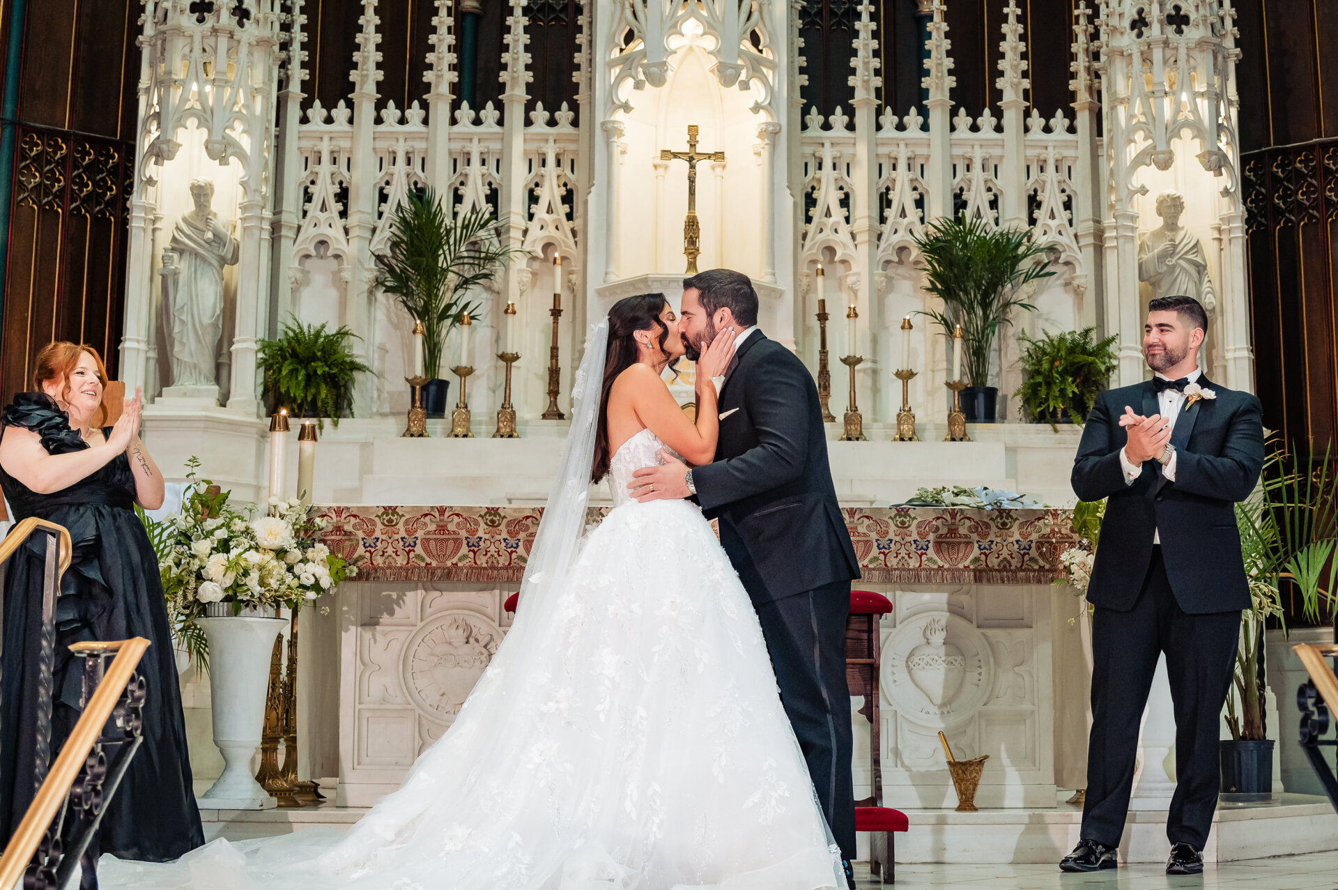 Newlyweds sharing their first kiss during the ceremony