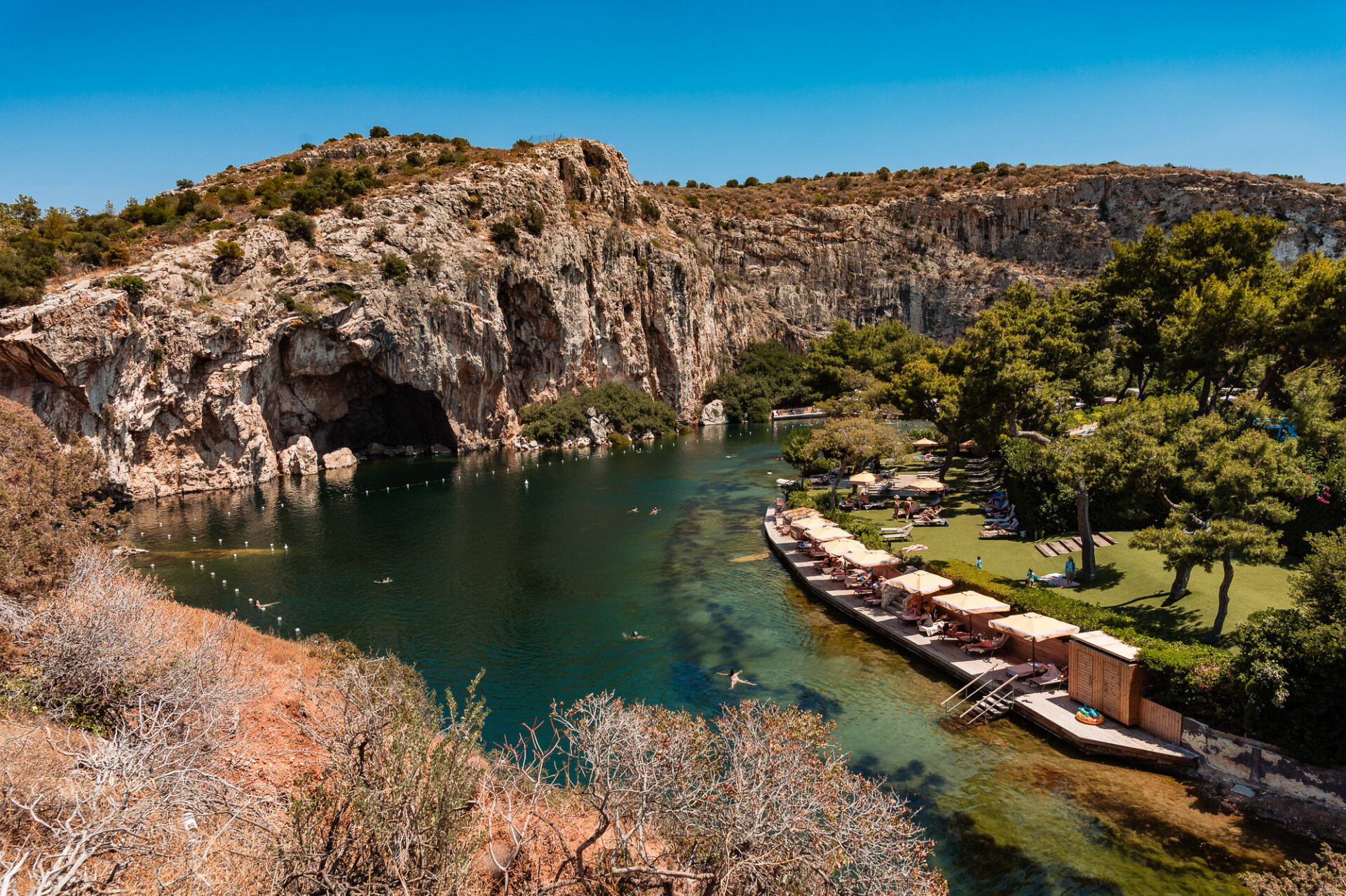 Lake Vouliagmeni, a unique natural thermal lake located in the Athenian Riviera, south of Vouliagmeni, Greece