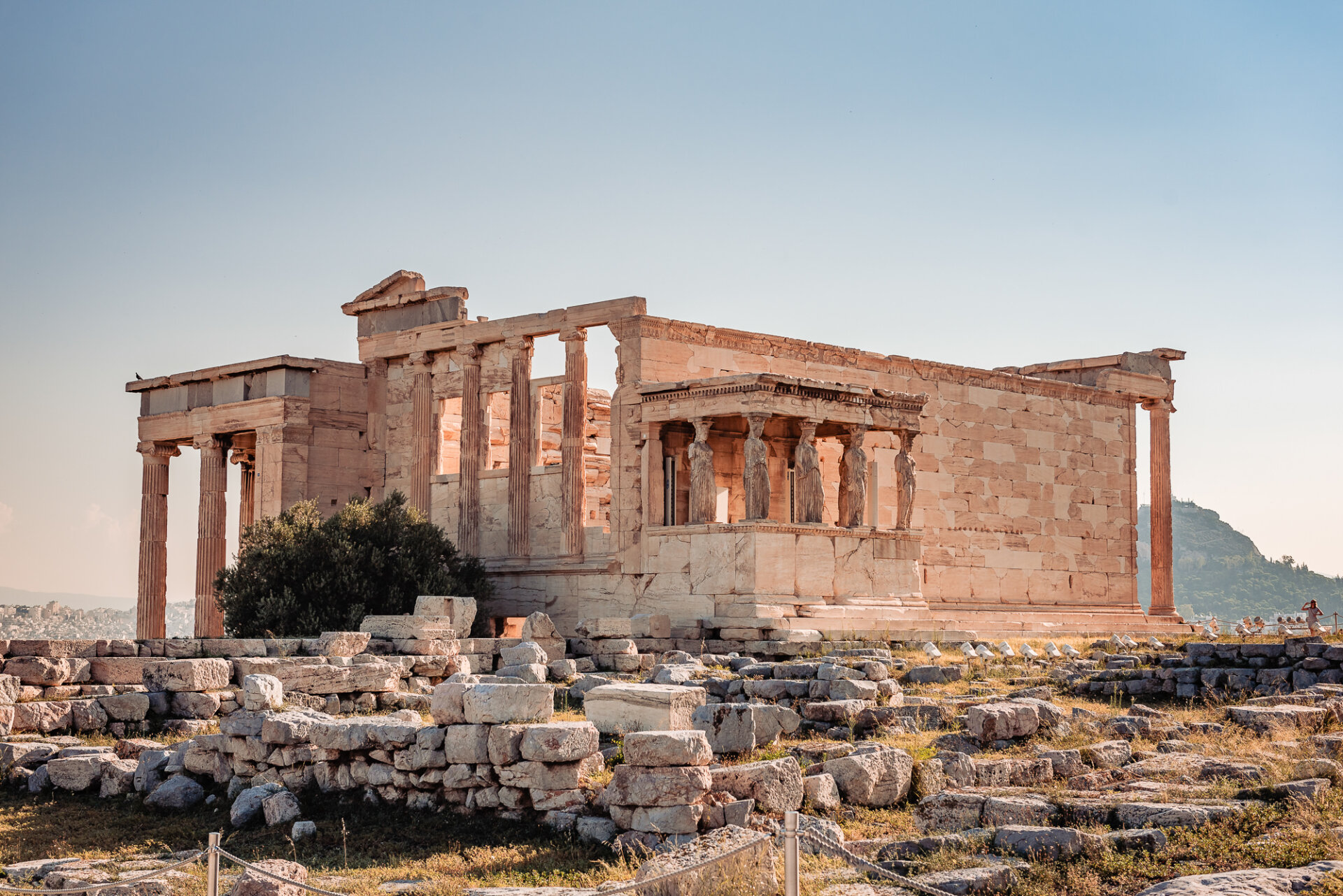 the Erechtheion, an ancient Greek temple located on the Acropolis of Athens,