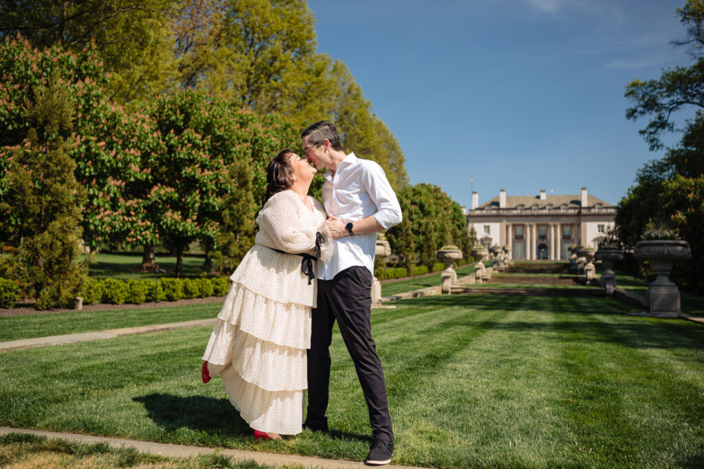 Sunlit kiss on the grand lawn of Nemours Estate
