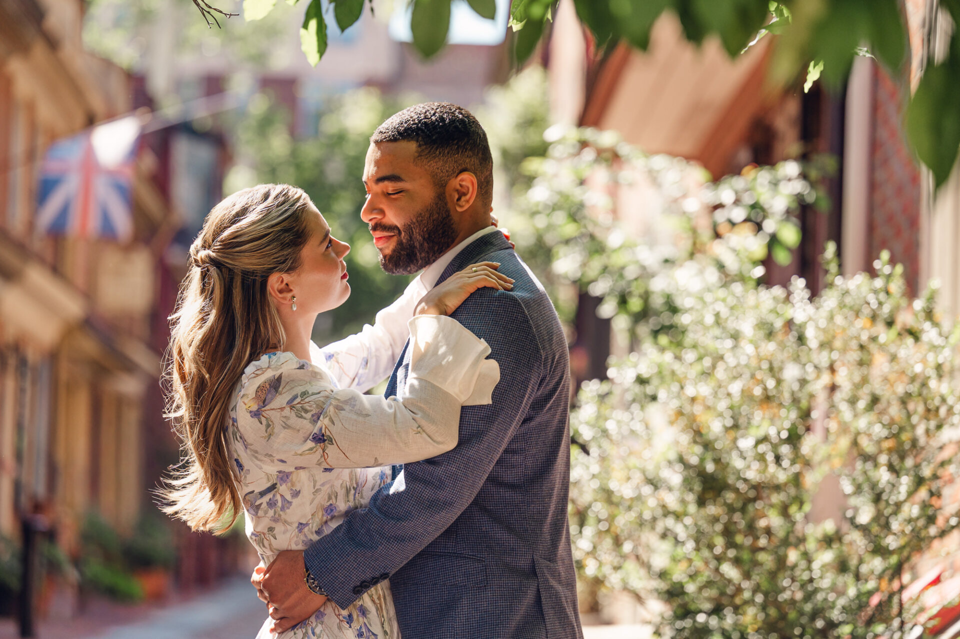 Candid engagement kiss during Old City Philadelphia photo session