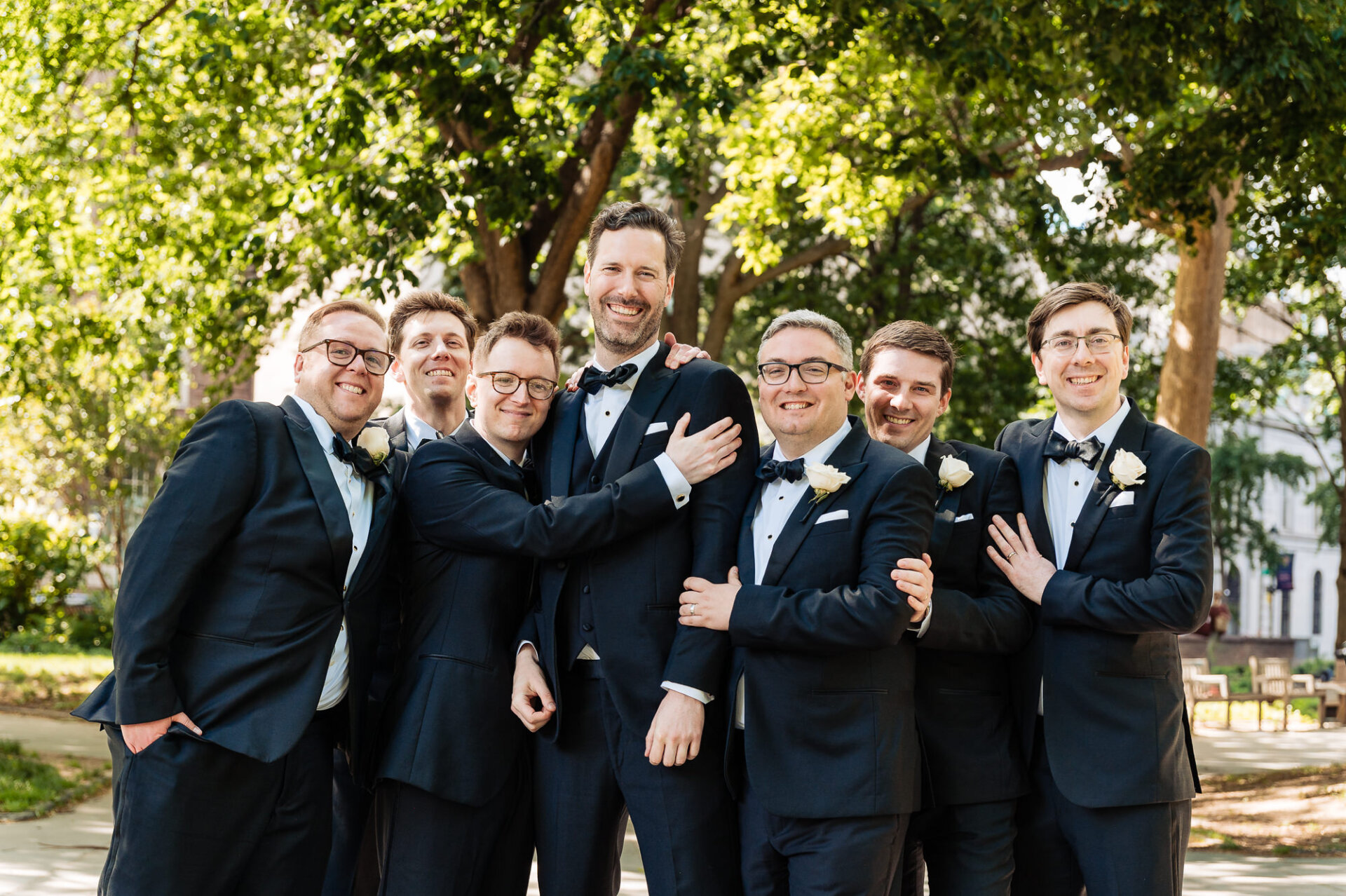 Groom portrait with his groomsmen in Philadelphia before the Union Trust wedding ceremony