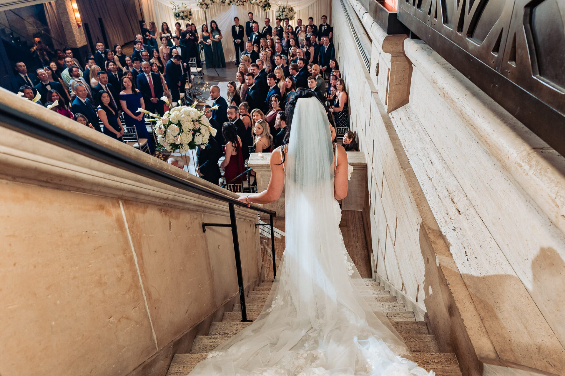 Bride’s view descending the grand staircase before an emotional Union Trust ceremony entrance