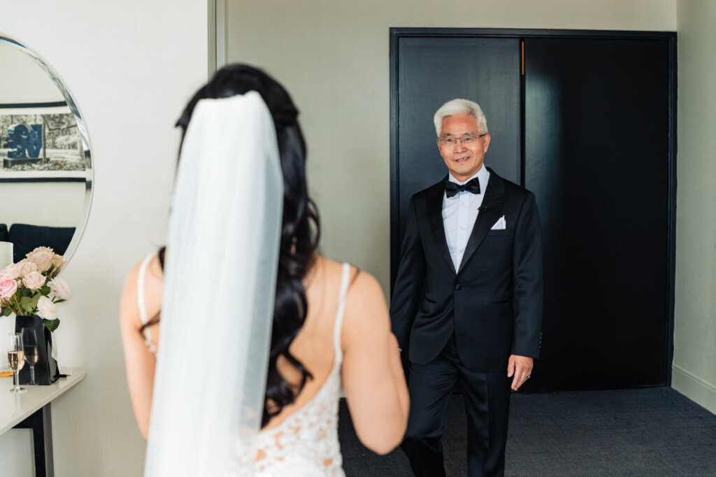 Emotional father-daughter first look before the wedding ceremony in Philadelphia