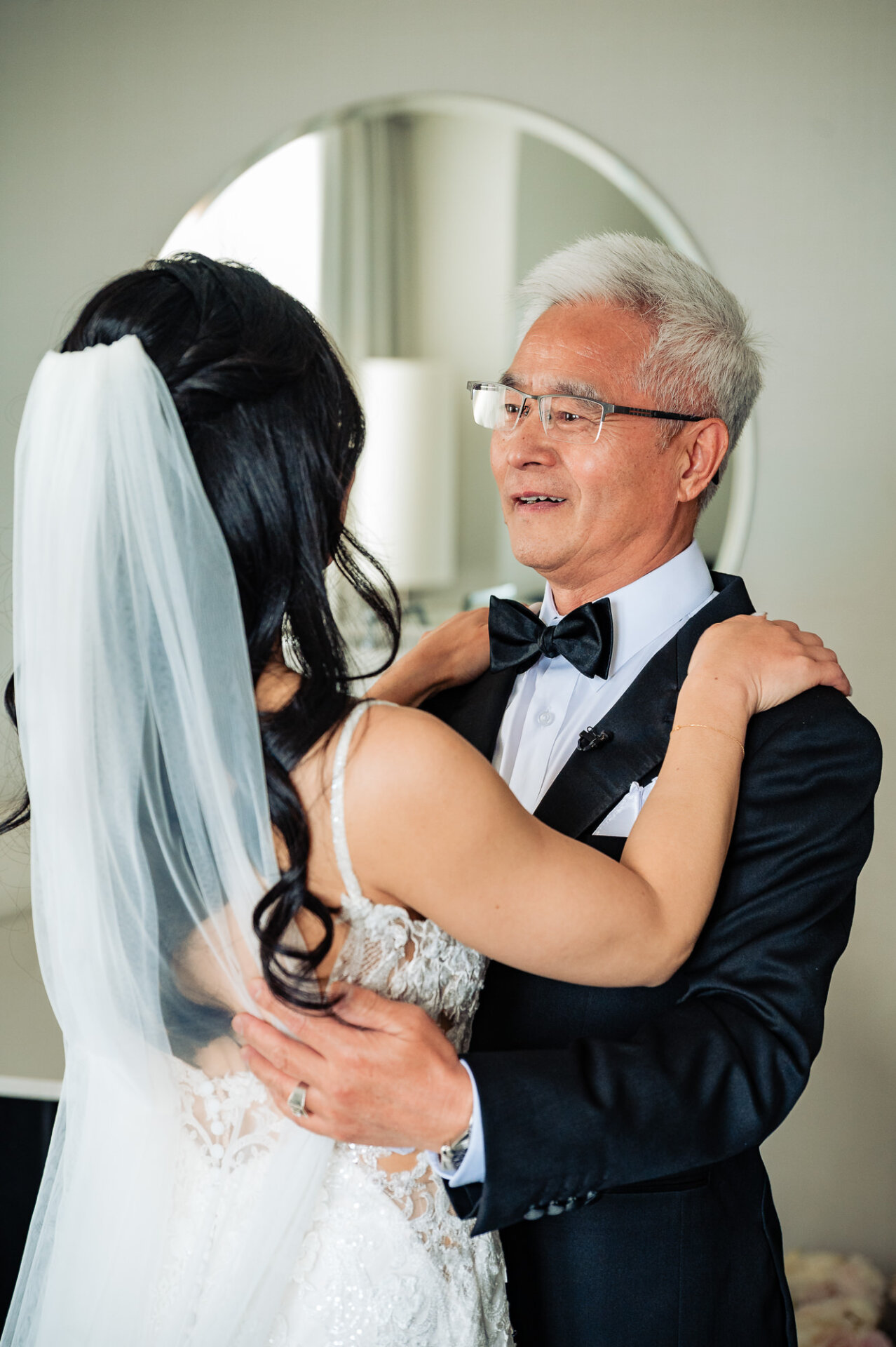 Emotional father-daughter first look before the wedding ceremony in Philadelphia