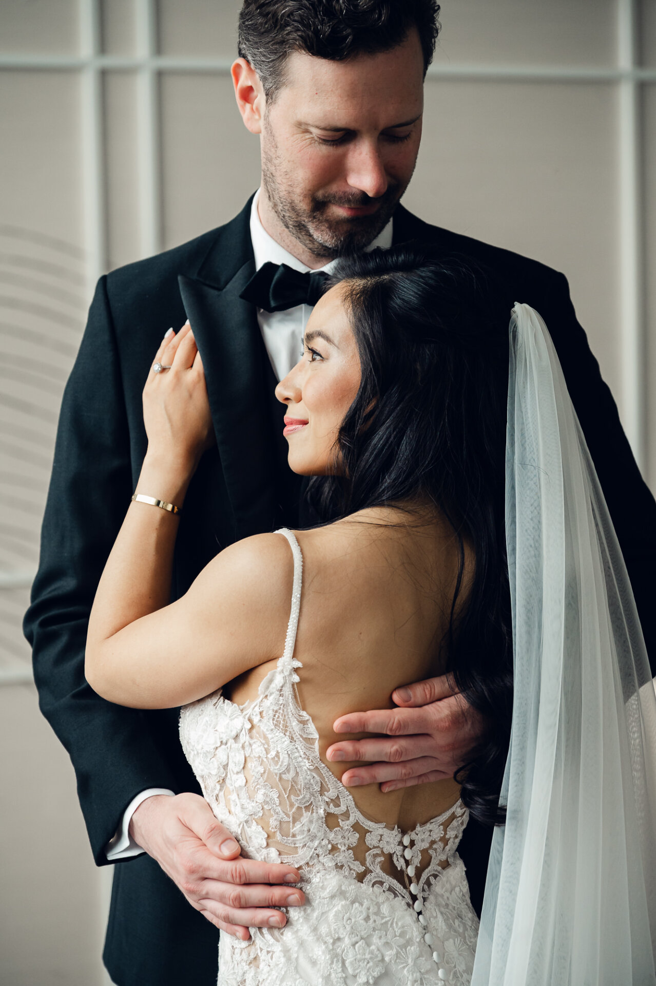 Intimate wedding portrait of Kim and Greg highlighting timeless style and genuine connection