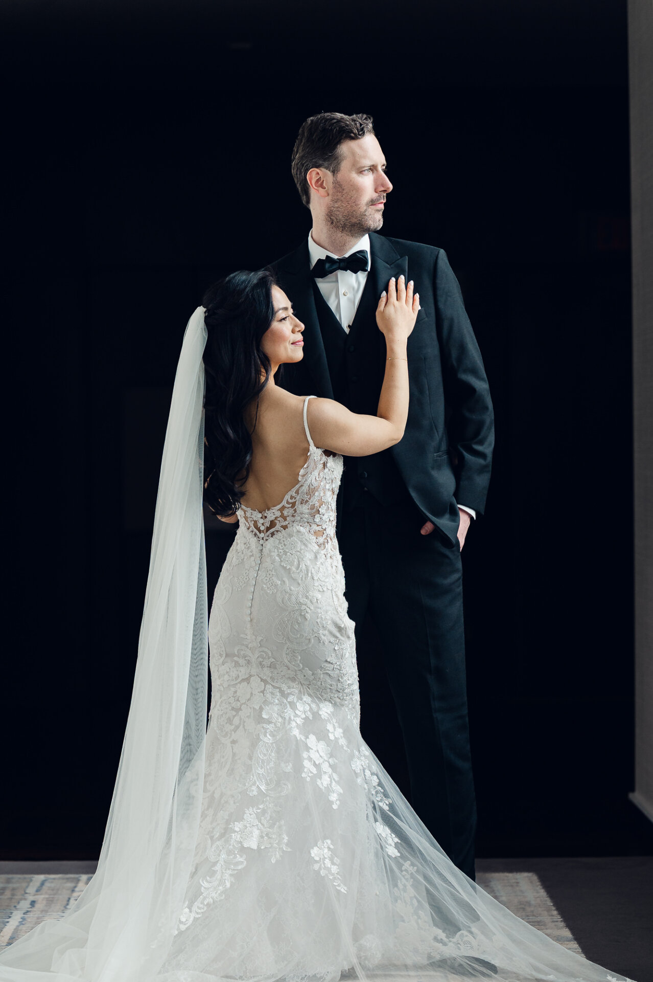 Editorial-inspired wedding portrait highlighting connection and refined bridal fashion