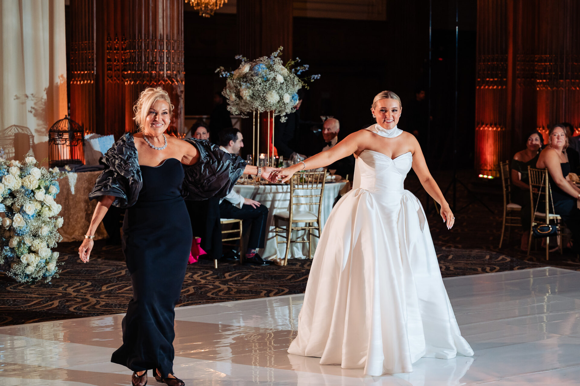 Bride dancing with her mother during the Crystal Tea Room wedding reception