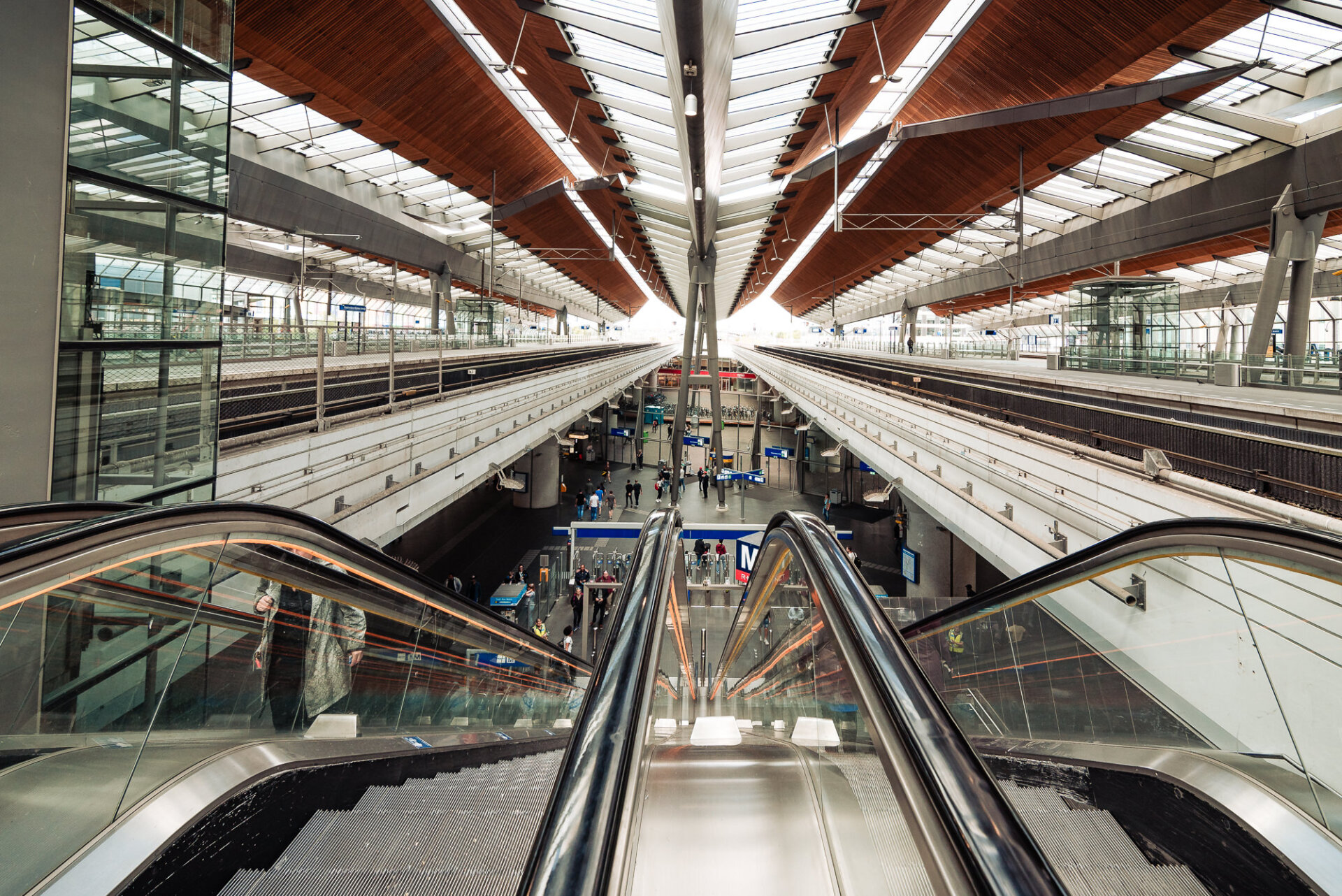 268. Modern train platforms and escalators inside Amsterdam Centraal Station